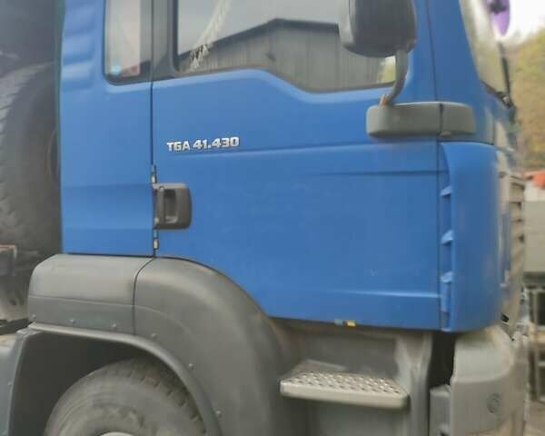 Синий МАН ТГА, объемом двигателя 10.5 л и пробегом 370 тыс. км за 48000 $, фото 3 на Automoto.ua