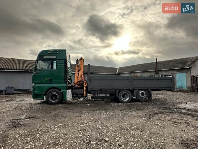 Зеленый МАН ТГА, объемом двигателя 12.9 л и пробегом 910 тыс. км за 28000 $, фото 1 на Automoto.ua