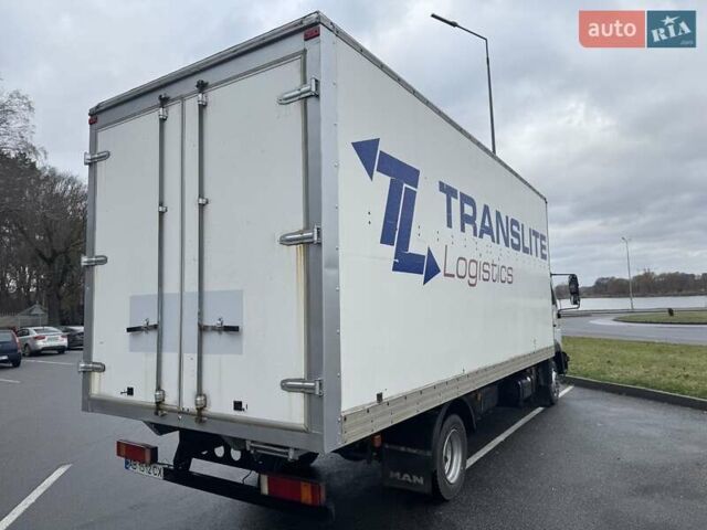 Белый МАН ТГЛ, объемом двигателя 4.58 л и пробегом 650 тыс. км за 12800 $, фото 2 на Automoto.ua