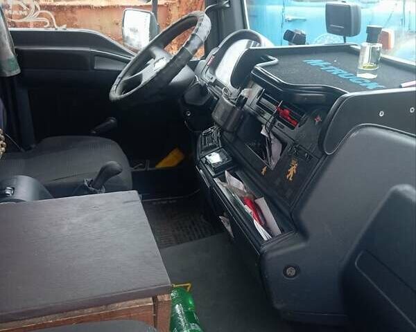 Белый МАН ТГЛ, объемом двигателя 4.58 л и пробегом 650 тыс. км за 15900 $, фото 1 на Automoto.ua