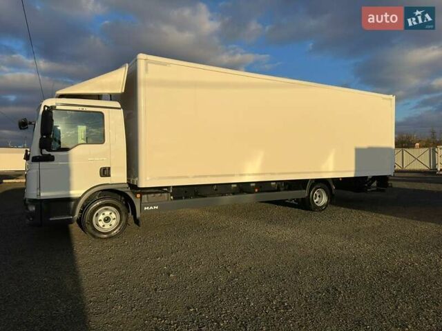 Белый МАН ТГЛ, объемом двигателя 4.6 л и пробегом 317 тыс. км за 48900 $, фото 1 на Automoto.ua