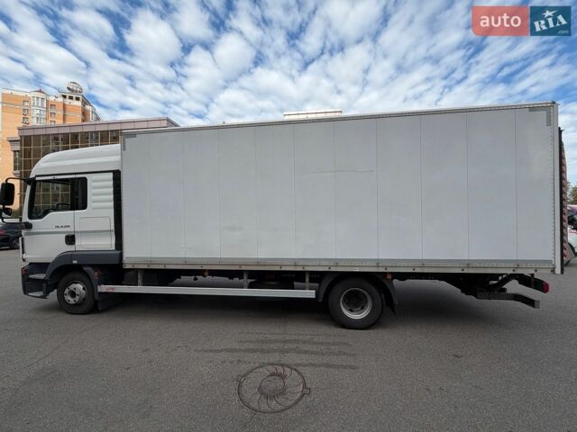 Белый МАН ТГЛ, объемом двигателя 4.6 л и пробегом 358 тыс. км за 58000 $, фото 1 на Automoto.ua
