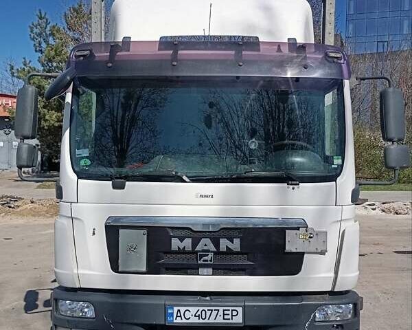 Белый МАН ТГЛ, объемом двигателя 4.58 л и пробегом 579 тыс. км за 17500 $, фото 2 на Automoto.ua