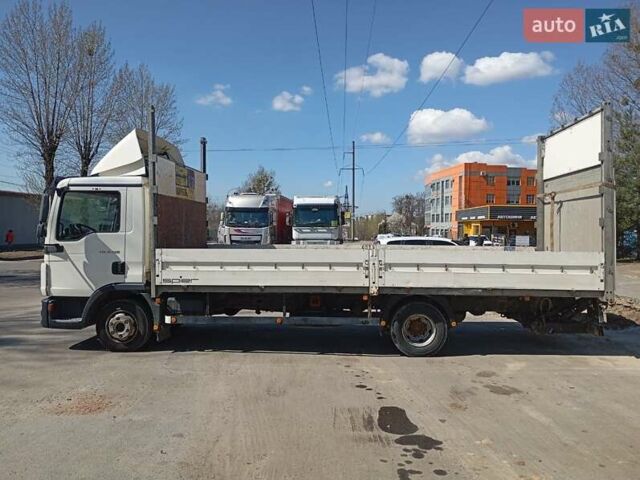 Белый МАН ТГЛ, объемом двигателя 4.58 л и пробегом 579 тыс. км за 18000 $, фото 3 на Automoto.ua