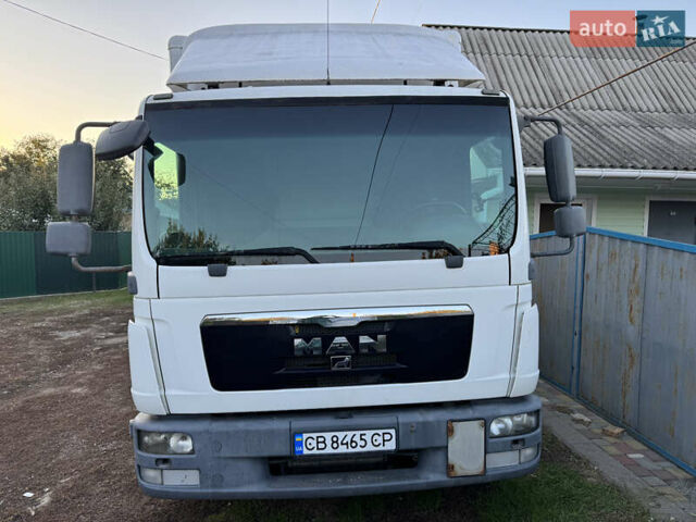 Белый МАН ТГЛ, объемом двигателя 4.58 л и пробегом 420 тыс. км за 18900 $, фото 1 на Automoto.ua