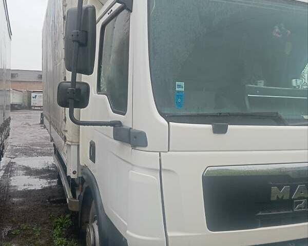 Белый МАН ТГЛ, объемом двигателя 4.58 л и пробегом 650 тыс. км за 17200 $, фото 2 на Automoto.ua