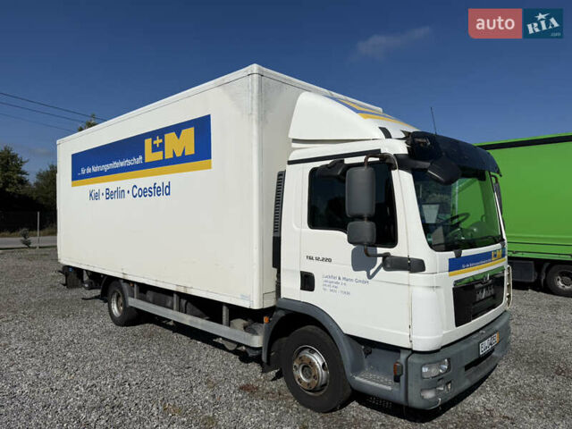 Белый МАН ТГЛ, объемом двигателя 4.6 л и пробегом 516 тыс. км за 32900 $, фото 1 на Automoto.ua