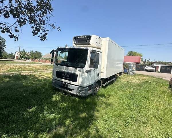 Белый МАН ТГЛ, объемом двигателя 4.8 л и пробегом 400 тыс. км за 21000 $, фото 2 на Automoto.ua