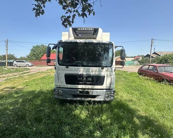 Белый МАН ТГЛ, объемом двигателя 4.8 л и пробегом 400 тыс. км за 21000 $, фото 1 на Automoto.ua