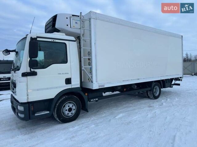 Белый МАН ТГЛ, объемом двигателя 4.6 л и пробегом 438 тыс. км за 33900 $, фото 1 на Automoto.ua