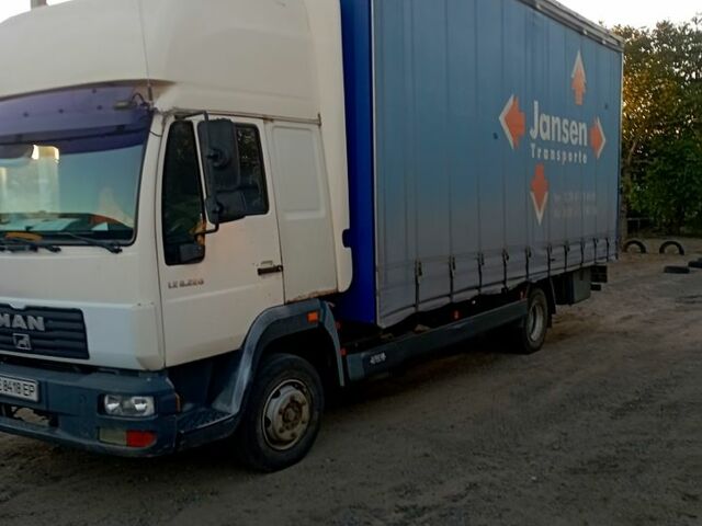 Білий МАН TGL, об'ємом двигуна 6.9 л та пробігом 500 тис. км за 10500 $, фото 1 на Automoto.ua