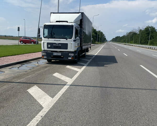 Белый МАН ТГЛ, объемом двигателя 4.6 л и пробегом 880 тыс. км за 13500 $, фото 1 на Automoto.ua