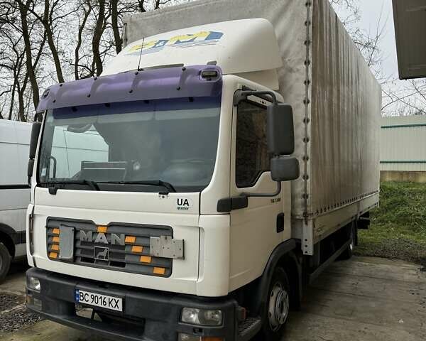 Белый МАН ТГЛ, объемом двигателя 4.58 л и пробегом 622 тыс. км за 14500 $, фото 2 на Automoto.ua