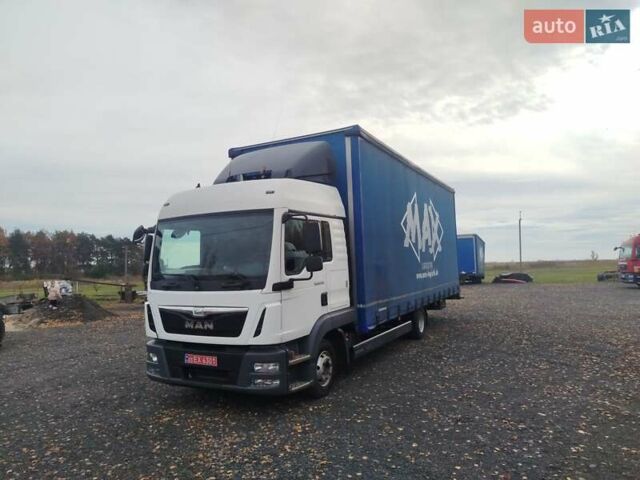 Белый МАН ТГЛ, объемом двигателя 4.6 л и пробегом 740 тыс. км за 30000 $, фото 1 на Automoto.ua