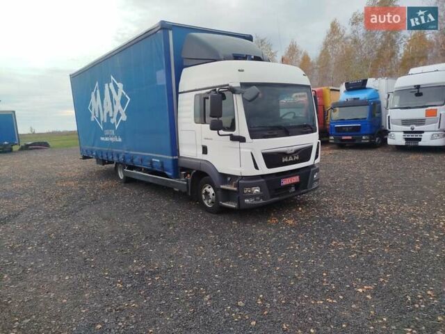 Белый МАН ТГЛ, объемом двигателя 4.6 л и пробегом 740 тыс. км за 30000 $, фото 2 на Automoto.ua