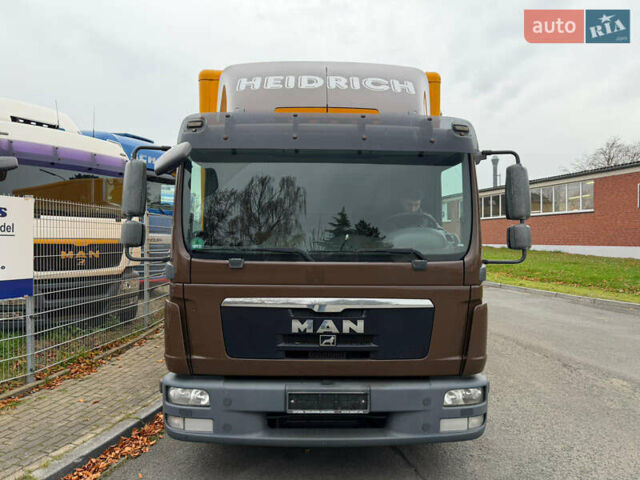 Коричневий МАН TGL, об'ємом двигуна 0 л та пробігом 244 тис. км за 24600 $, фото 1 на Automoto.ua