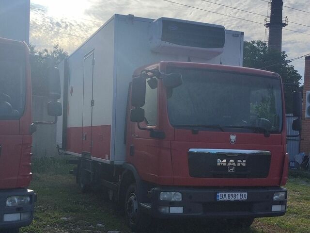 Красный МАН ТГЛ, объемом двигателя 4.58 л и пробегом 805 тыс. км за 21000 $, фото 2 на Automoto.ua