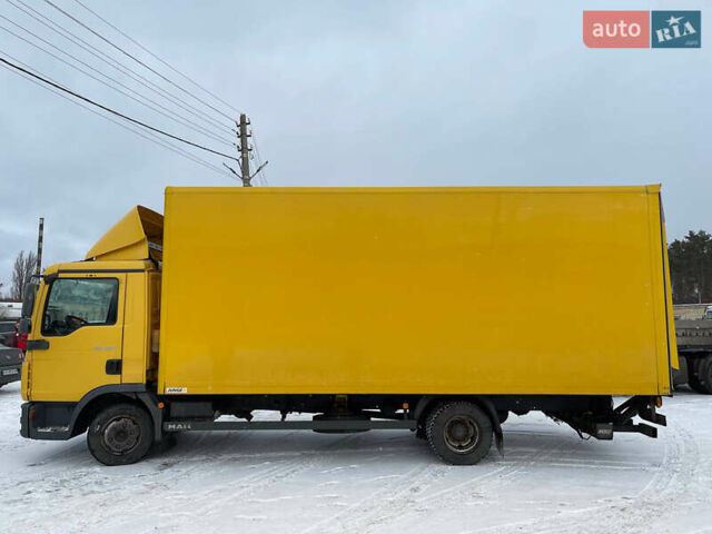 Желтый МАН ТГЛ, объемом двигателя 4.58 л и пробегом 600 тыс. км за 20999 $, фото 2 на Automoto.ua
