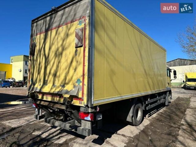 Желтый МАН ТГЛ, объемом двигателя 6.9 л и пробегом 628 тыс. км за 40200 $, фото 2 на Automoto.ua