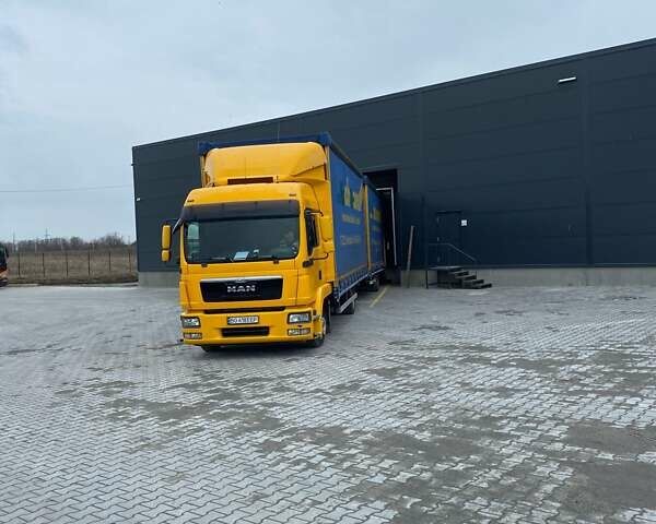 Желтый МАН ТГЛ, объемом двигателя 4.58 л и пробегом 910 тыс. км за 33000 $, фото 1 на Automoto.ua