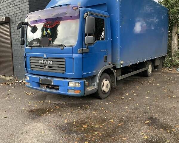Синий МАН ТГЛ, объемом двигателя 4.6 л и пробегом 705 тыс. км за 16900 $, фото 1 на Automoto.ua