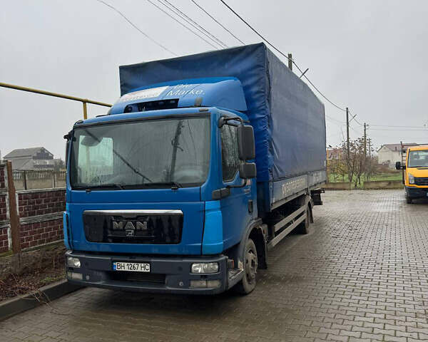 Синий МАН ТГЛ, объемом двигателя 4.58 л и пробегом 425 тыс. км за 16999 $, фото 1 на Automoto.ua