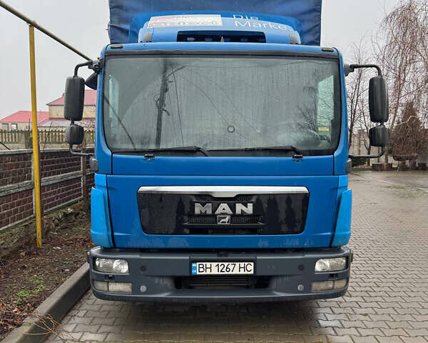 Синий МАН ТГЛ, объемом двигателя 4.58 л и пробегом 425 тыс. км за 16999 $, фото 3 на Automoto.ua
