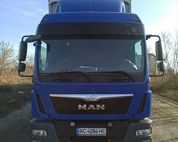 Синий МАН ТГЛ, объемом двигателя 6.87 л и пробегом 965 тыс. км за 30000 $, фото 2 на Automoto.ua