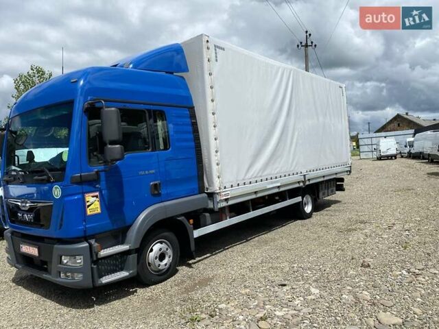 Синий МАН ТГЛ, объемом двигателя 4.6 л и пробегом 430 тыс. км за 33999 $, фото 2 на Automoto.ua
