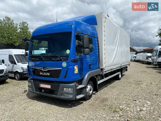 Синий МАН ТГЛ, объемом двигателя 4.6 л и пробегом 430 тыс. км за 33999 $, фото 1 на Automoto.ua