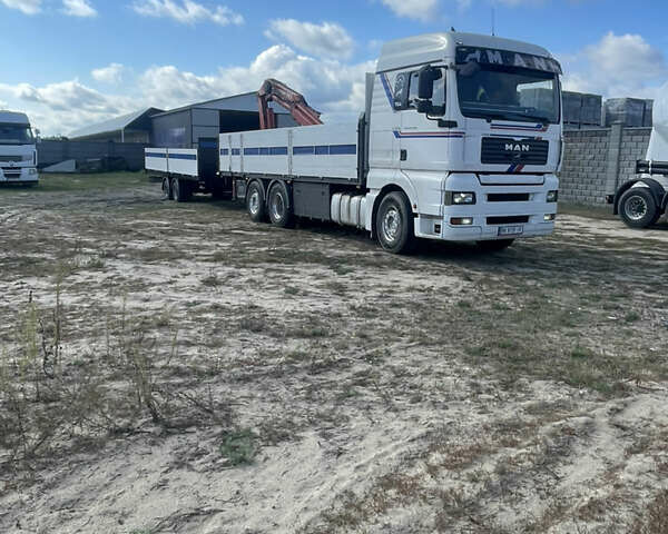 Білий МАН ТГКС, об'ємом двигуна 12 л та пробігом 300 тис. км за 40500 $, фото 1 на Automoto.ua