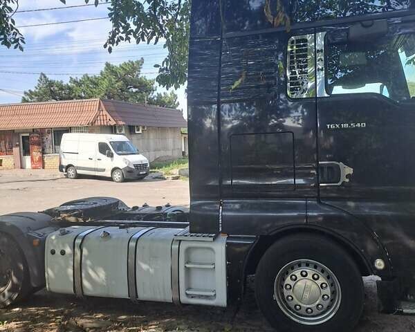 Черный МАН ТГКС, объемом двигателя 12.42 л и пробегом 800 тыс. км за 10500 $, фото 5 на Automoto.ua