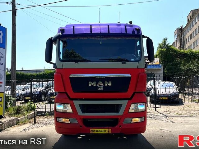 Красный МАН ТГКС, объемом двигателя 10 л и пробегом 246 тыс. км за 9990 $, фото 1 на Automoto.ua