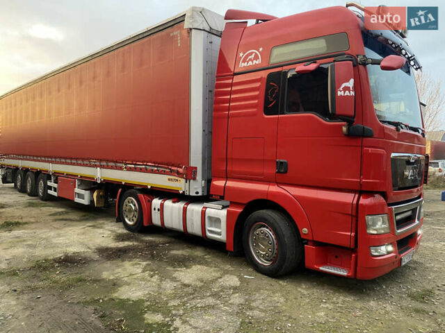 Красный МАН ТГКС, объемом двигателя 10.52 л и пробегом 107 тыс. км за 29000 $, фото 1 на Automoto.ua