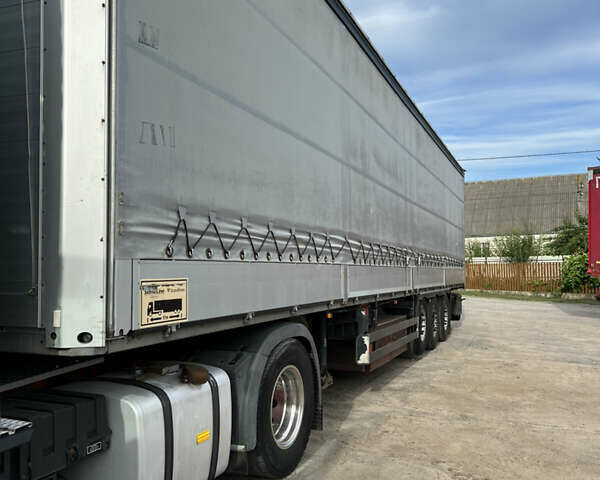 Красный МАН ТГКС, объемом двигателя 10.8 л и пробегом 823 тыс. км за 18000 $, фото 1 на Automoto.ua