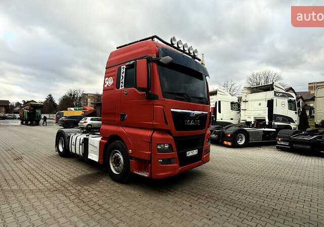 Красный МАН ТГКС, объемом двигателя 12.42 л и пробегом 980 тыс. км за 20000 $, фото 1 на Automoto.ua