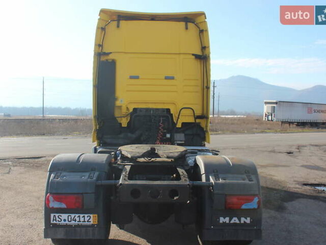 Желтый МАН ТГКС, объемом двигателя 10.5 л и пробегом 976 тыс. км за 16904 $, фото 4 на Automoto.ua