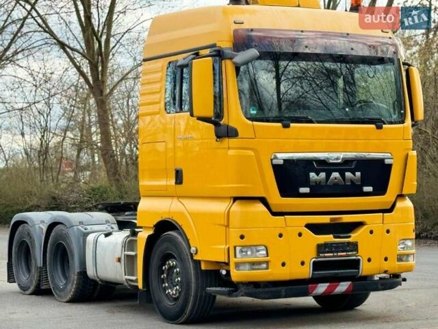 Желтый МАН ТГКС, объемом двигателя 12.5 л и пробегом 243 тыс. км за 51771 $, фото 2 на Automoto.ua