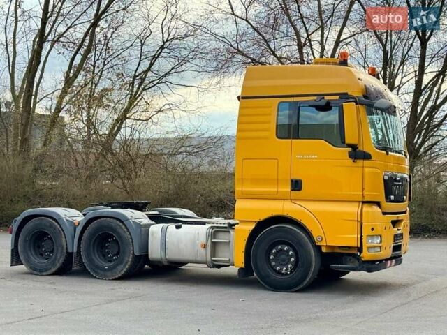 Желтый МАН ТГКС, объемом двигателя 12.5 л и пробегом 243 тыс. км за 51771 $, фото 3 на Automoto.ua