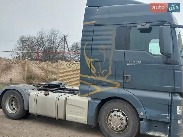 Серый МАН ТГКС, объемом двигателя 12.4 л и пробегом 916 тыс. км за 18500 $, фото 1 на Automoto.ua