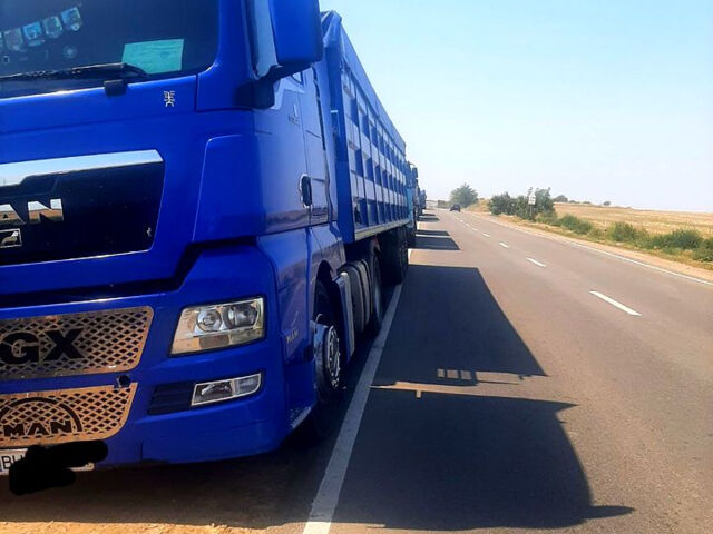 Синий МАН ТГКС, объемом двигателя 12 л и пробегом 900 тыс. км за 32000 $, фото 1 на Automoto.ua