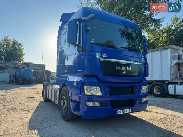 Синий МАН ТГКС, объемом двигателя 10.52 л и пробегом 879 тыс. км за 21600 $, фото 2 на Automoto.ua