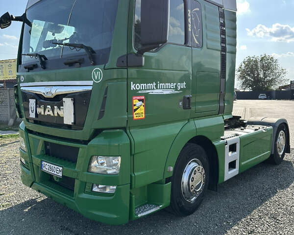 Зеленый МАН ТГКС, объемом двигателя 12.42 л и пробегом 905 тыс. км за 15000 $, фото 2 на Automoto.ua