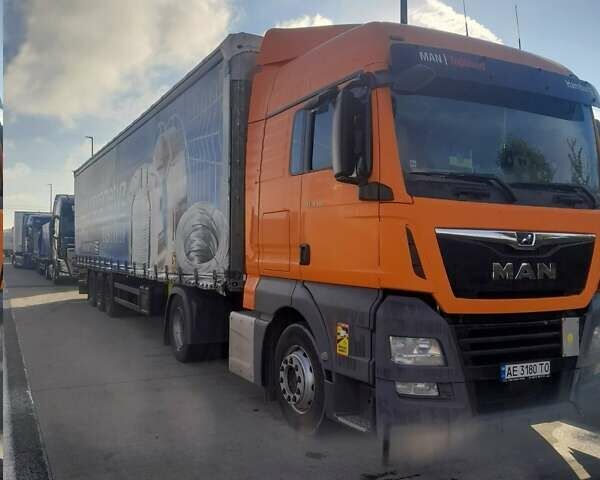 Помаранчевий МАН ТГКС, об'ємом двигуна 12.42 л та пробігом 660 тис. км за 34998 $, фото 1 на Automoto.ua