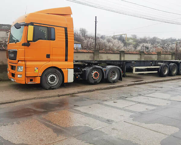 Оранжевый МАН ТГКС, объемом двигателя 12.4 л и пробегом 820 тыс. км за 17400 $, фото 2 на Automoto.ua