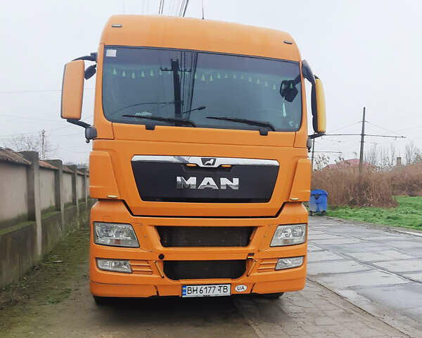 Оранжевый МАН ТГКС, объемом двигателя 12.4 л и пробегом 820 тыс. км за 17400 $, фото 1 на Automoto.ua