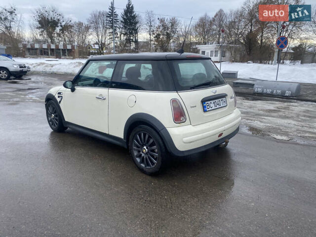Белый Мини Купер, объемом двигателя 1.4 л и пробегом 240 тыс. км за 3750 $, фото 6 на Automoto.ua