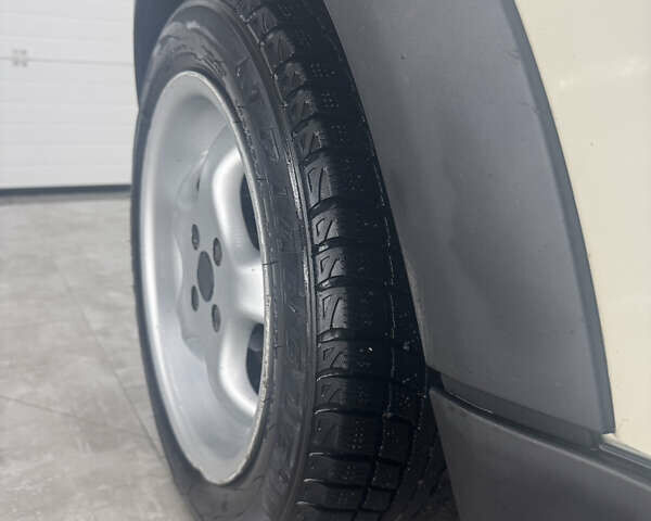 Білий Міні Cooper, об'ємом двигуна 1.4 л та пробігом 229 тис. км за 6500 $, фото 5 на Automoto.ua