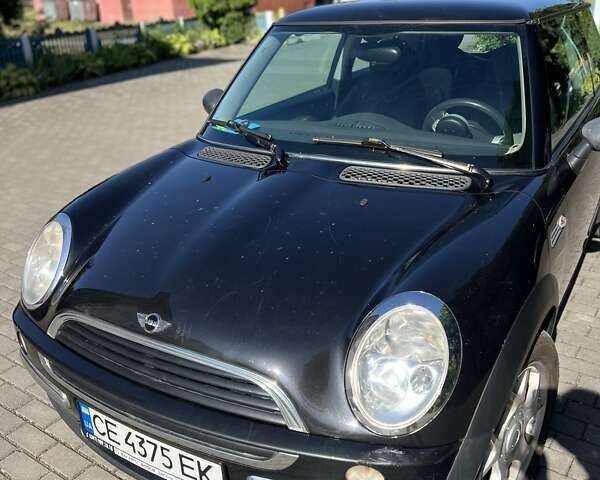 Черный Мини Купер, объемом двигателя 1.6 л и пробегом 265 тыс. км за 4000 $, фото 6 на Automoto.ua