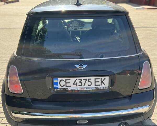 Черный Мини Купер, объемом двигателя 1.6 л и пробегом 265 тыс. км за 4000 $, фото 2 на Automoto.ua
